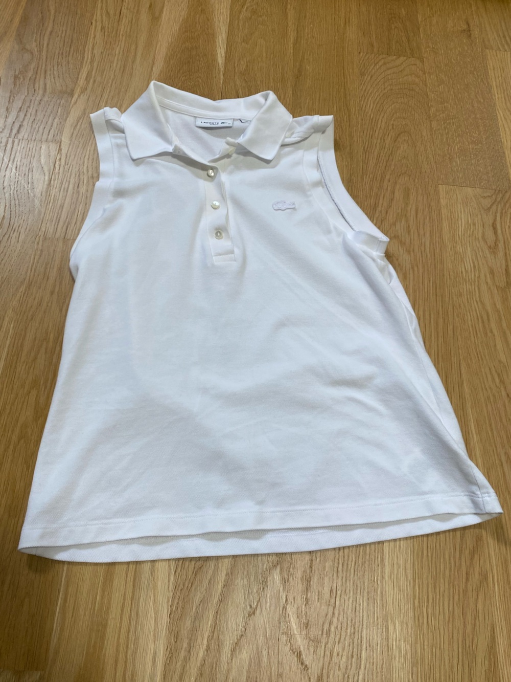 Lacoste White Slim Fit Sleeveless Pique Polo Top in Size 40. Excellent condition